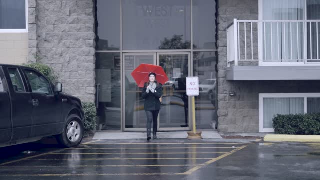 Girl walking rain
