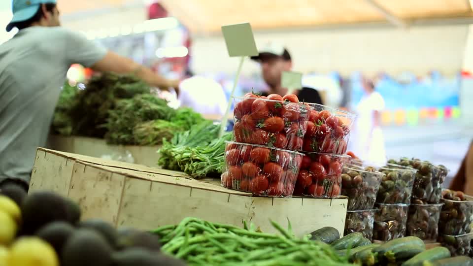 Vegetable stand tomatoes red