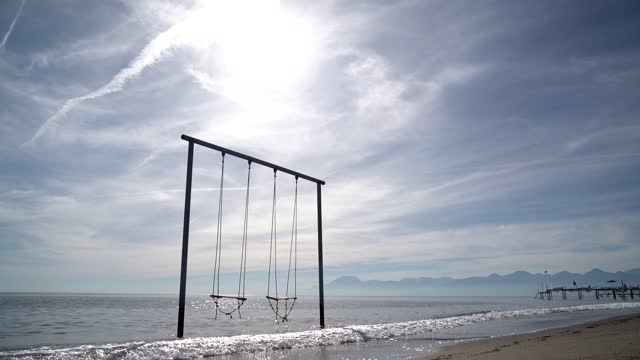 Beach swing water
