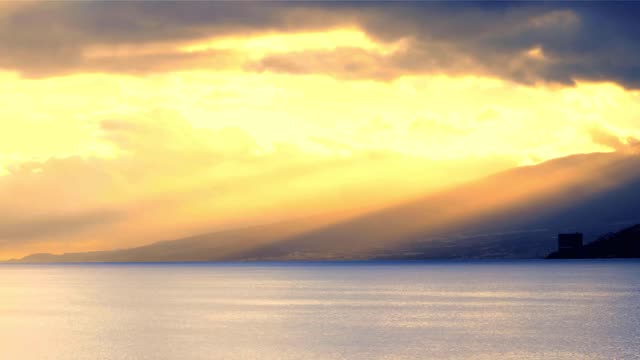 Sun rays sunset ocean