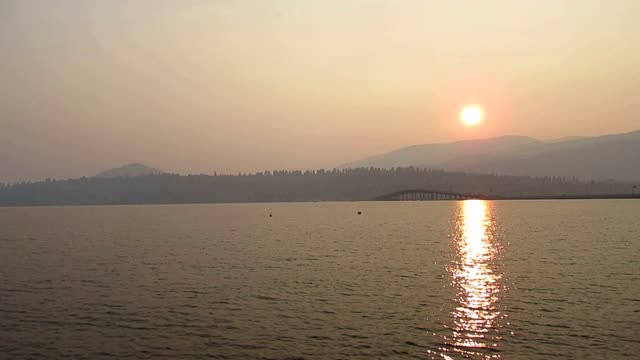 Sunset lake woman
