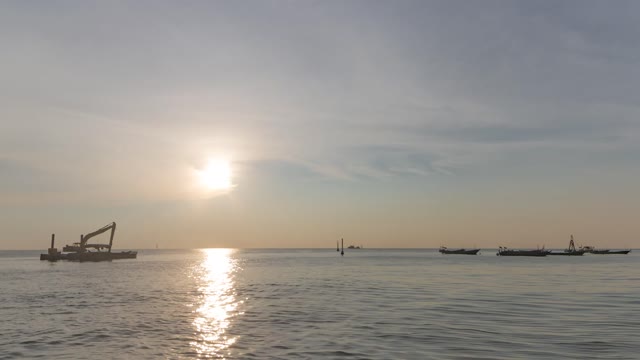 Seaside sunset boat