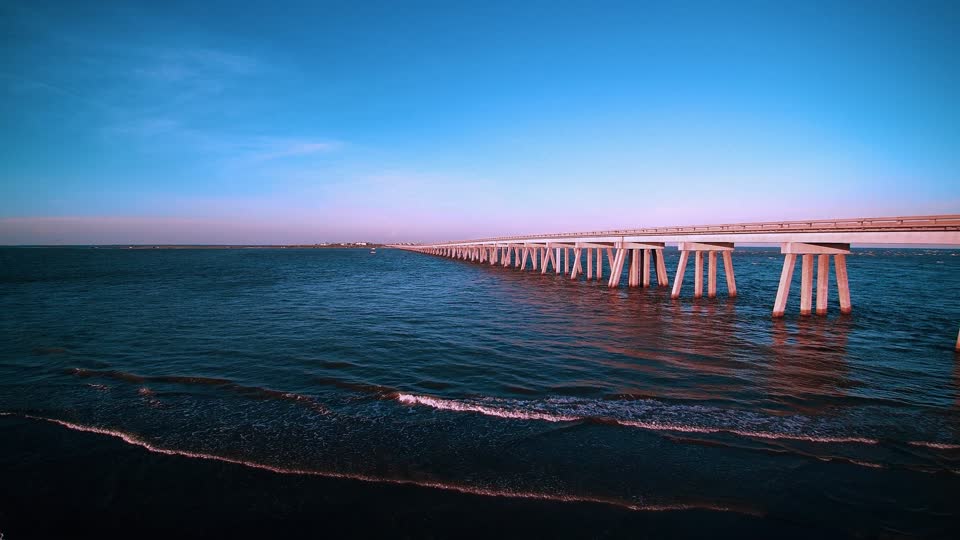 Sunset ocean bridge
