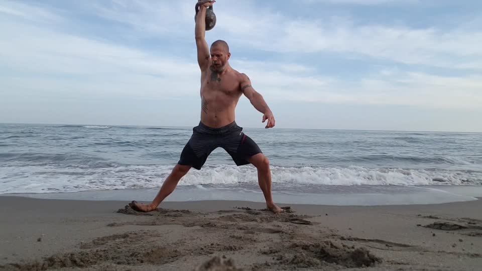 Kettlebell overhead cossack kettlebells cossack squat