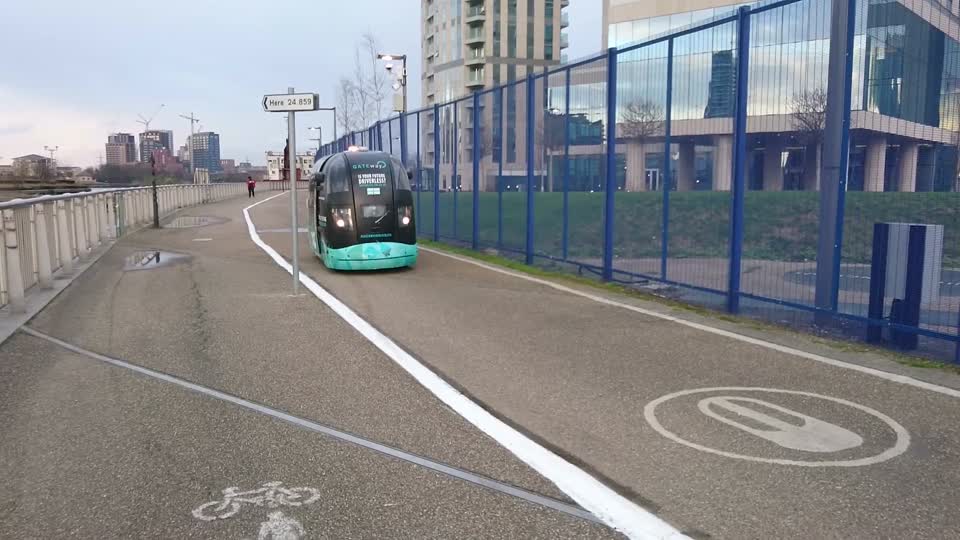 The Future. Driverless electric cars. They are being tested by The O2 Arena
