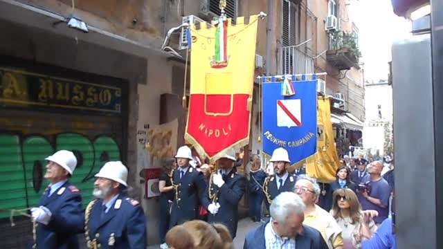Embroidered banners at procession of silver reliquary-busts of the Saints in Naples (May 6, 2017)