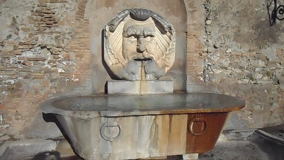 Fountain with mask by Giacomo Della Porta (Porlezza 1532-Rome 1602) and granite tub of the classical age, at Aventino in Rome - Set of the film by Paolo Sorrentino "The Great Beauty