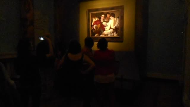 The Musicians" [with portrait of painter] (about 1595) by Caravaggio (Milan 1571-Porto Ercole / Grosseto 1610) - from New York, The Metropolitan Museum of Arts, to Naples, Zevallos Museum, up to July 14, 2017