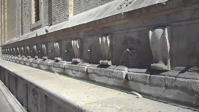 Fountain of Medici, with 26 spouts (1610; restored 1770) at Santa Maria degli Angeli at Assisi
