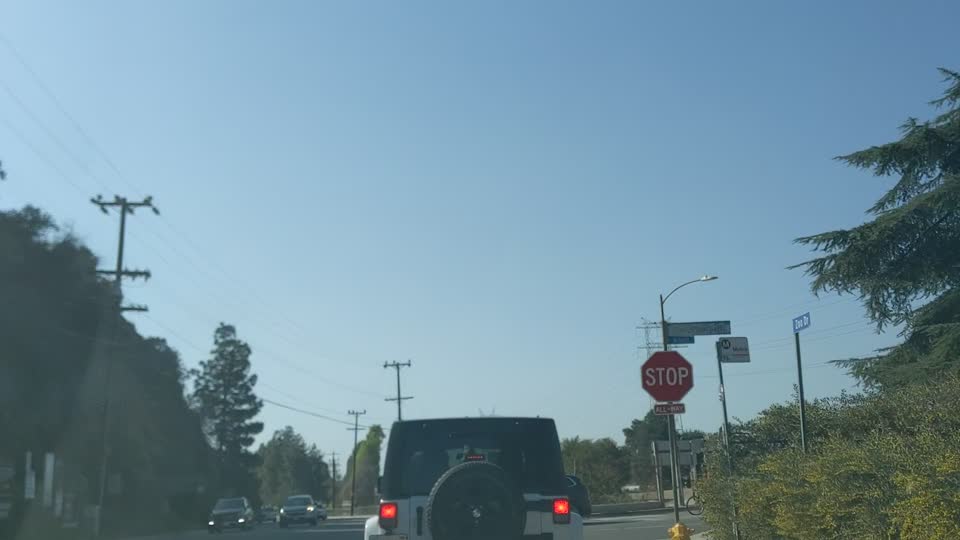 Tim Kasper's white Jeep Wrangler California plates 8HAE941