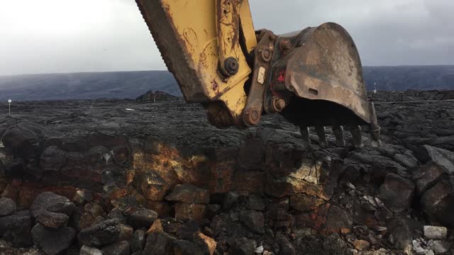 6.1.18 Machinery clearing lava rock from Chain of Craters Kalapana Road