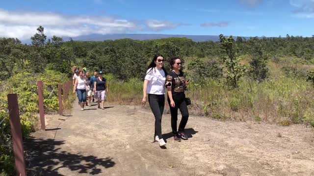 Park visitors hike Crater Rim Trail near Steam Vents on 9/22/18
