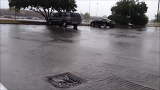 Rain in OfficeMax parking lot