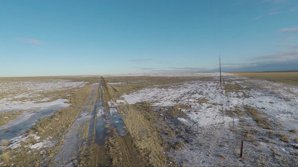 Overhead 3 Looking NW along road showing fence line