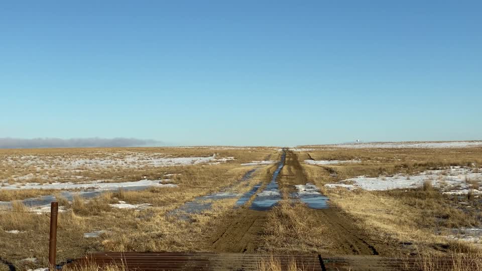 NW Road pan left to fence line