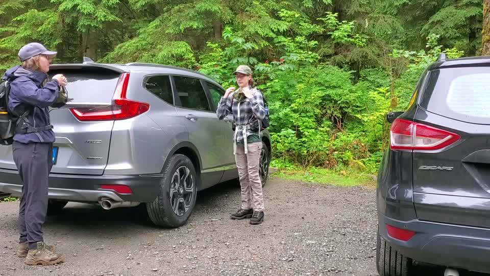 Putting on masks in the Lake Twenty-Two parking lot, Mt. Baker-Snoqualmie National Forest. Video taken by Holly Snarr July 17, 2020