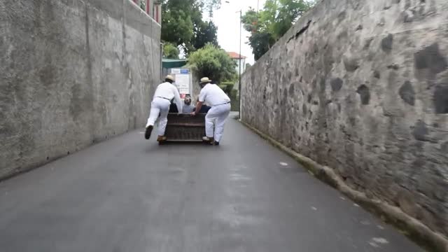 Madeira 2018. Funchal. Monte Toboggan ride.  Two people, 30 Euros for 2 Km  and 10 minutes of downhill fun, for two people.