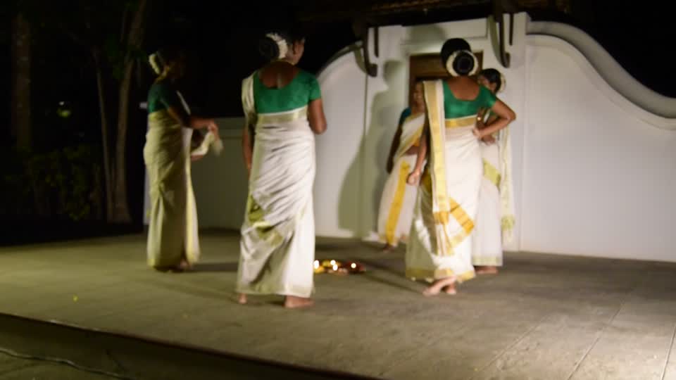 India. Kerala. Kumarakom. Coconut Lagoon on the shore of Lake Vembanad. Local song and dance troupe.