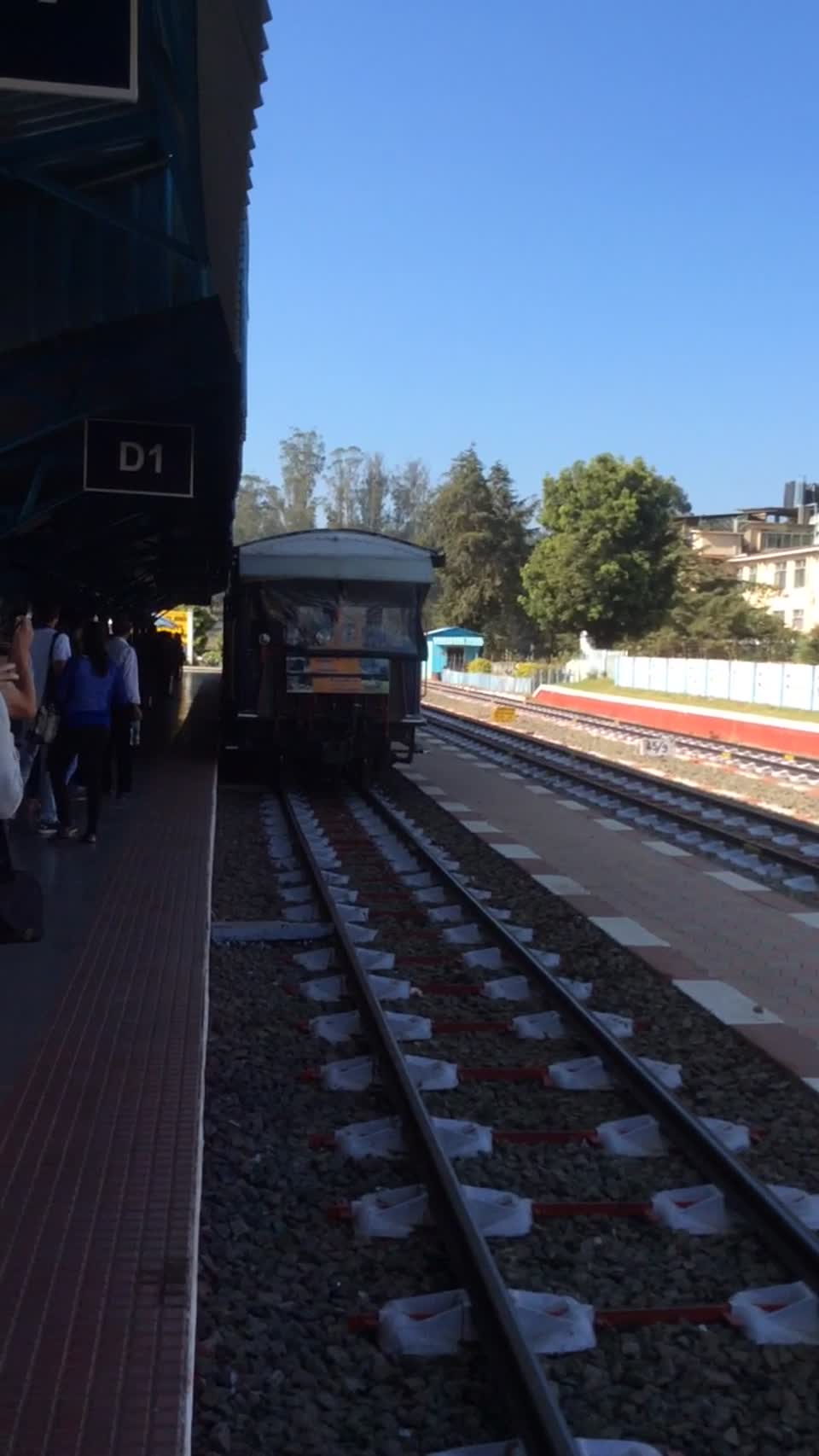 India. Ooty. The heritage train to Coonor, being pulled by a small diesel engine. Video taken by Anne.