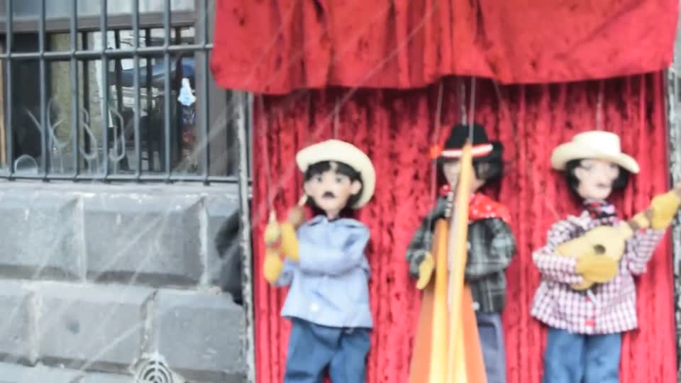 Ecuador. Quito. Street entertainers, are busy all day.
