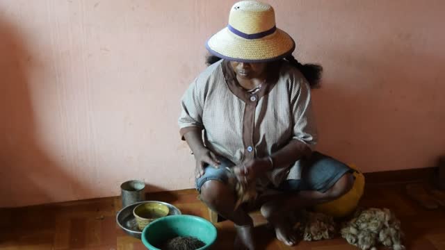 Madagascar. Fianarantsoa to Ambalavao. We visited a silk factory. The ladies, roll out the thread on their legs. Read below.
