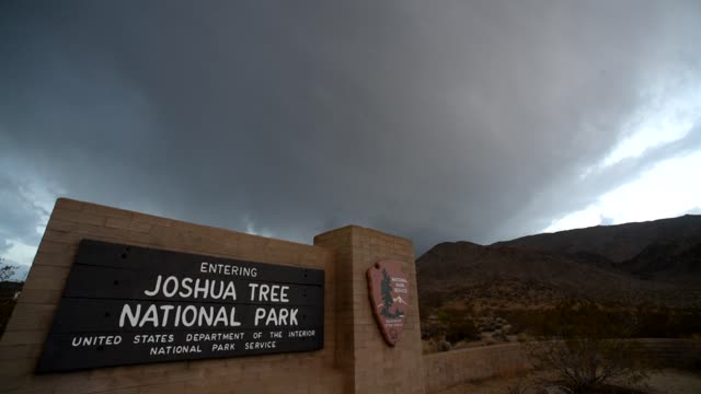 Lightning Flashes over the Joshua Tree National Park Entrance Sign